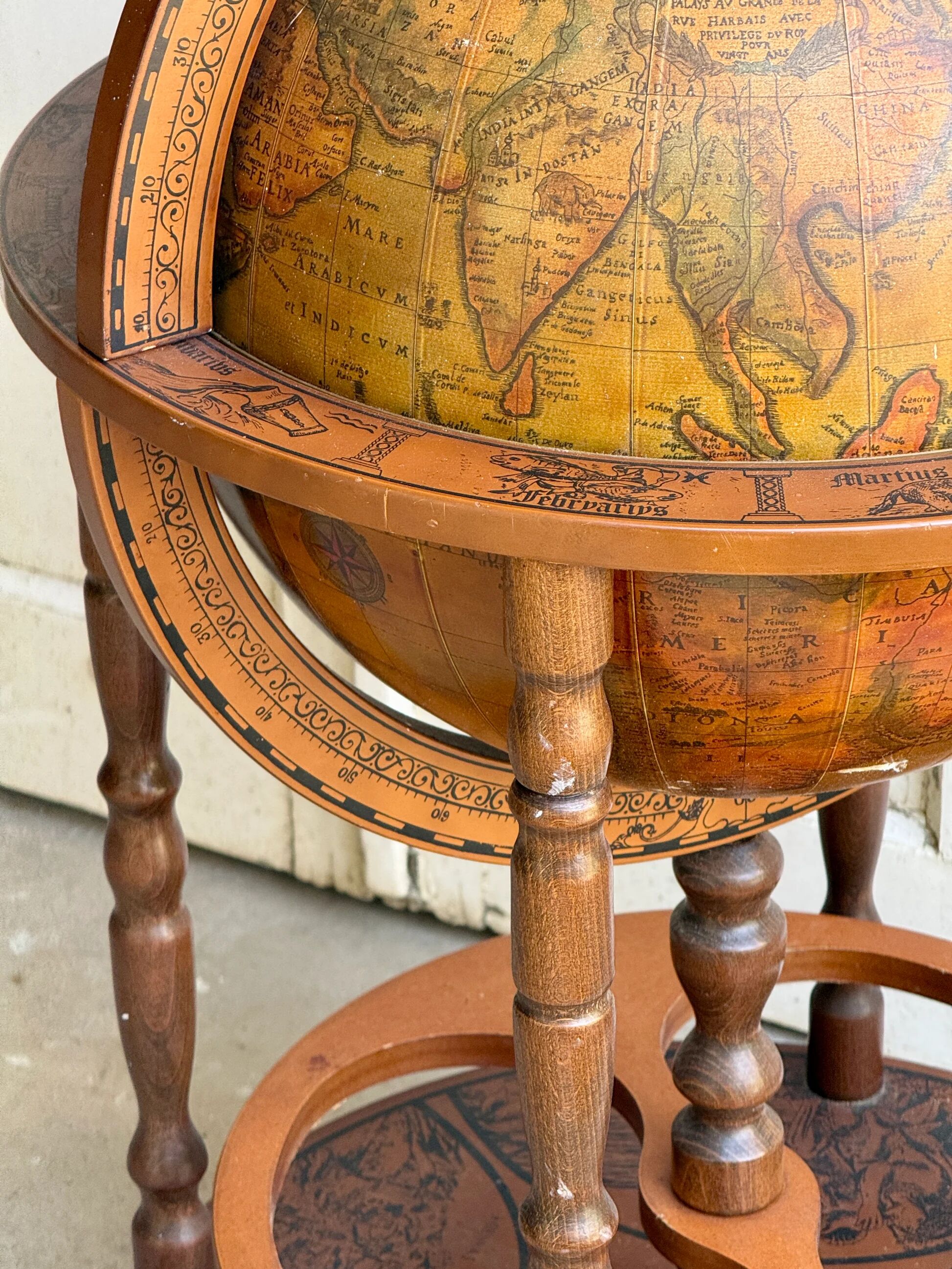 Globe bar on wheels with a rotating tray