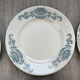 6 green and blue mismatched iron earth plates