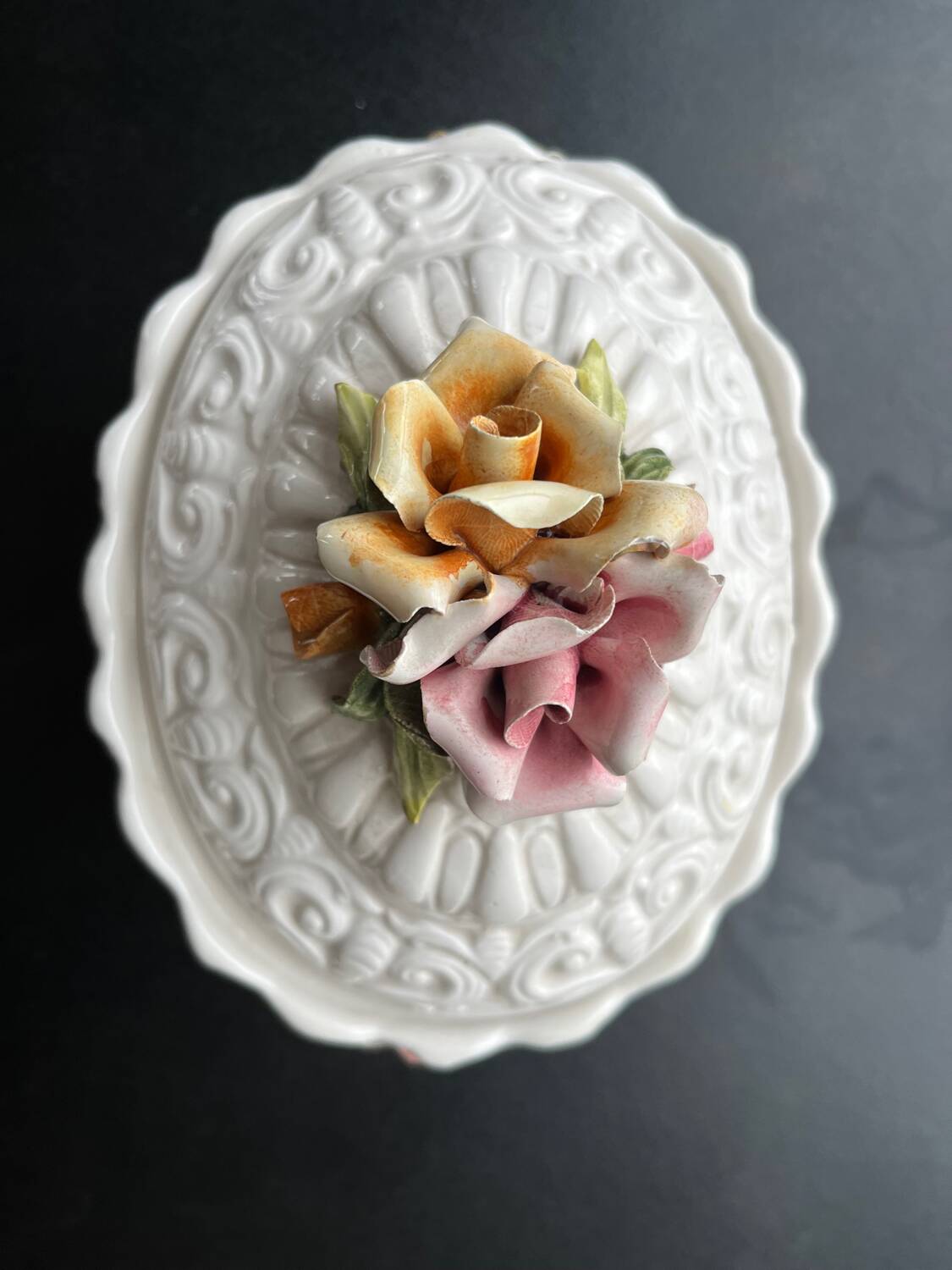 Capodimonte-style porcelain lidded sugar bowl with floral relief
