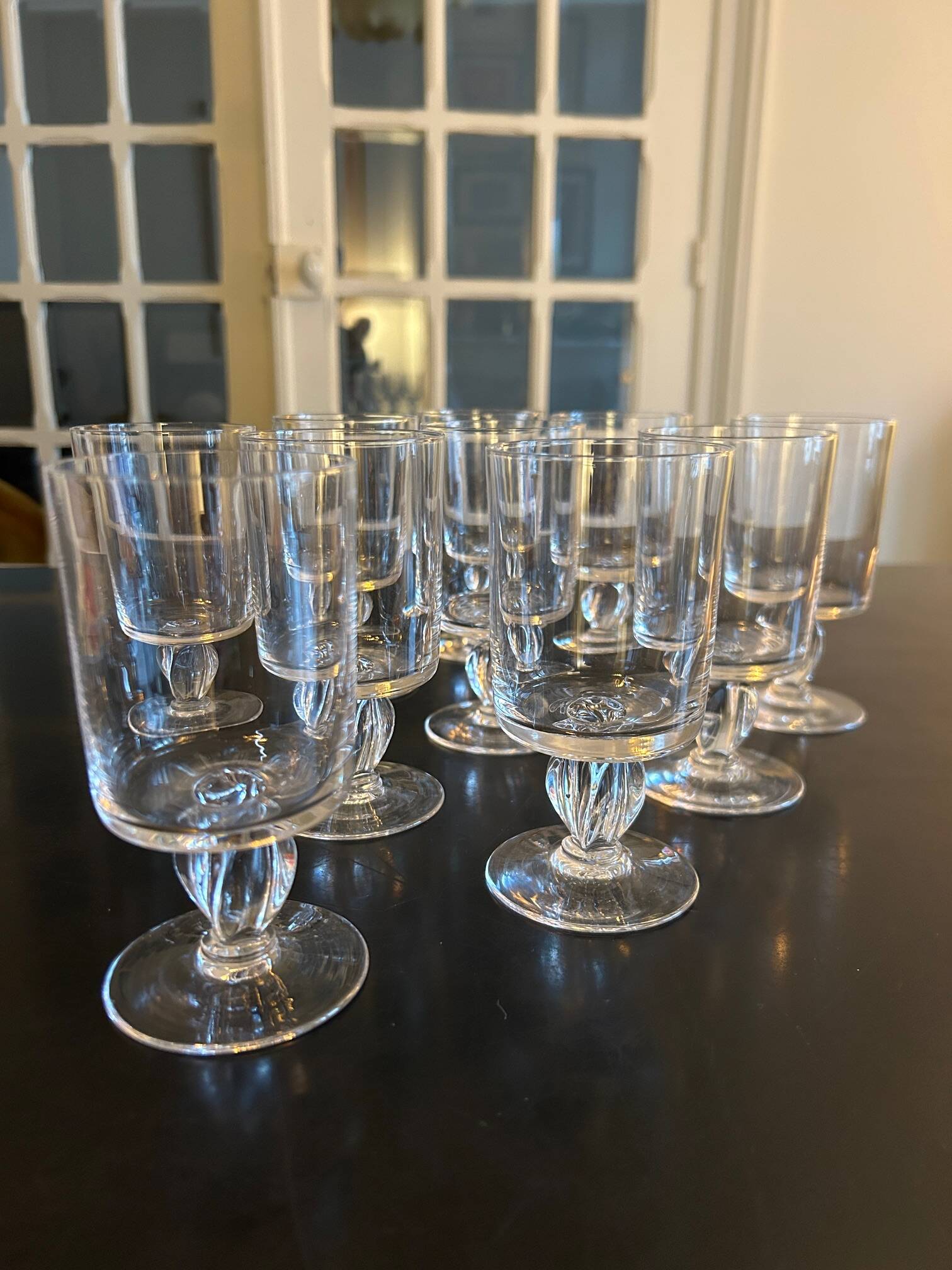 10 old glasses with twisted stems