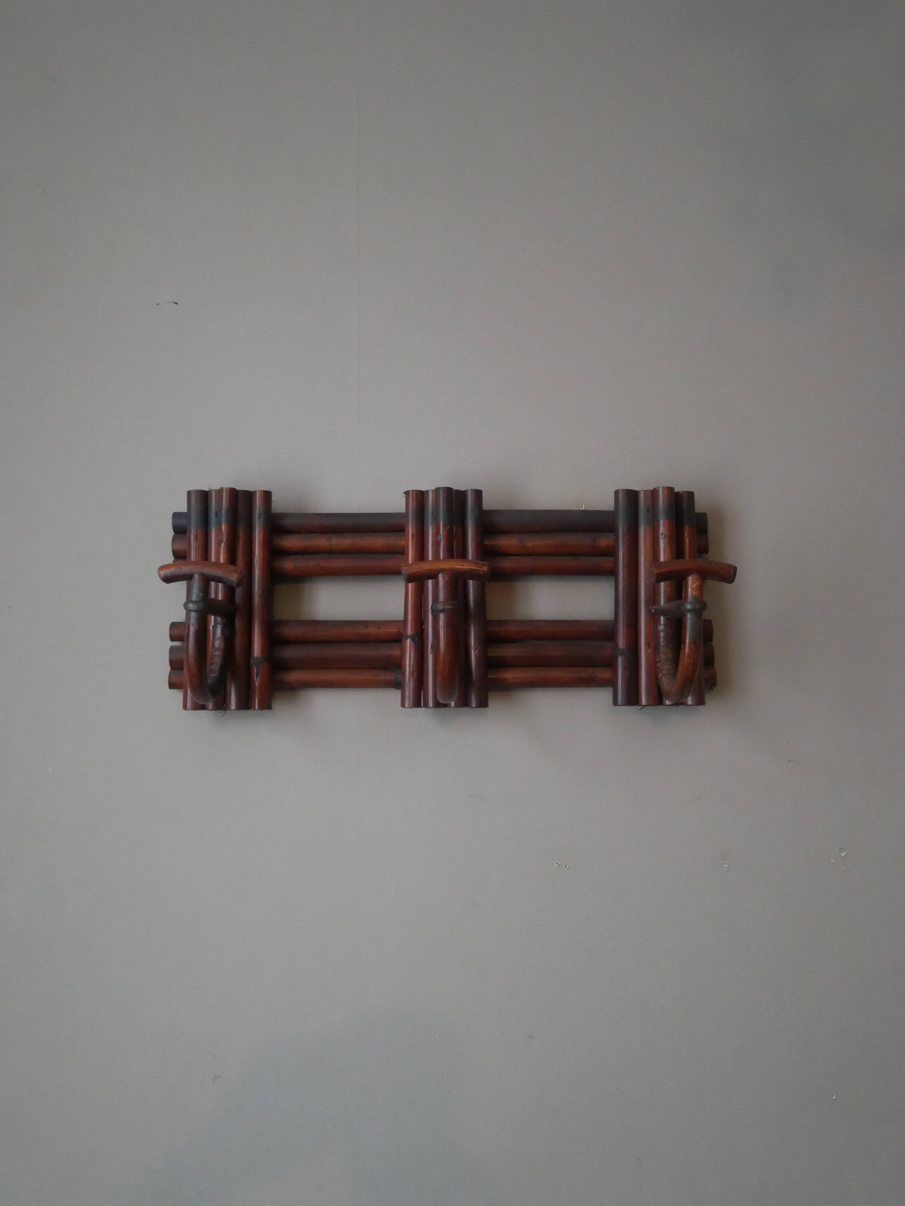 Vintage rattan handcrafted coat rack with three hooks, country decor