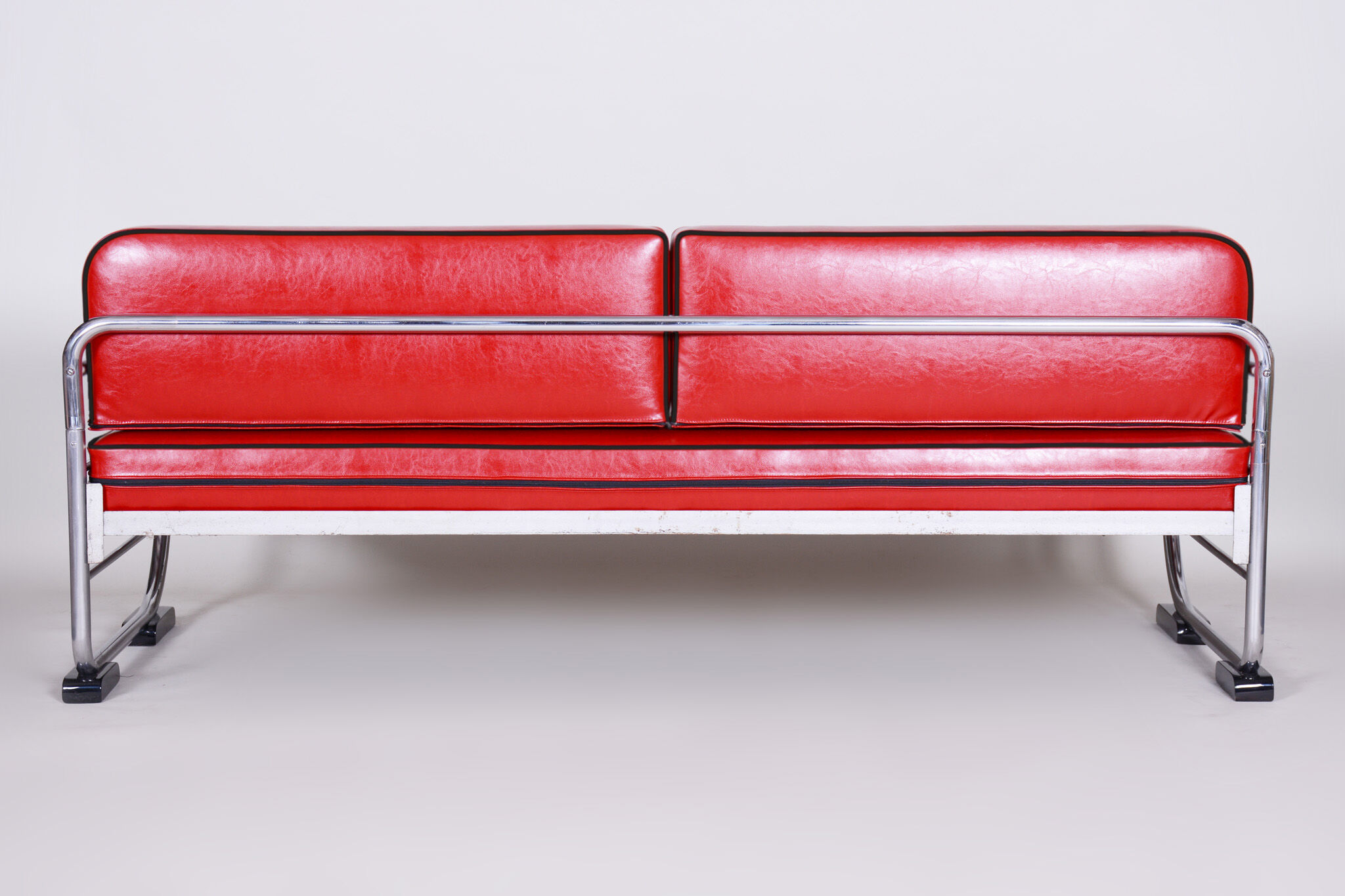 Red Slezak leather sofa made in 1930s Czechia