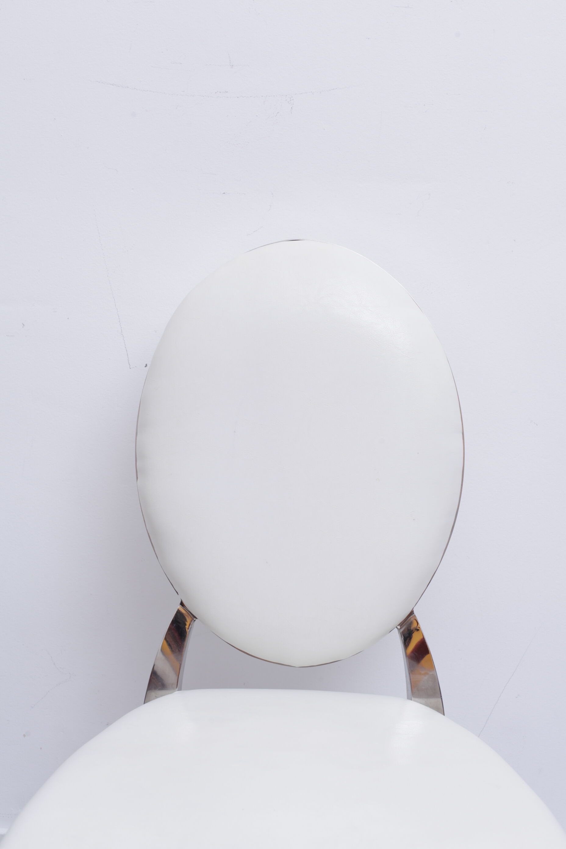 White skai chair and chrome legs