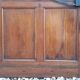 Oak entrance door and its frame and transom, wrought iron gates