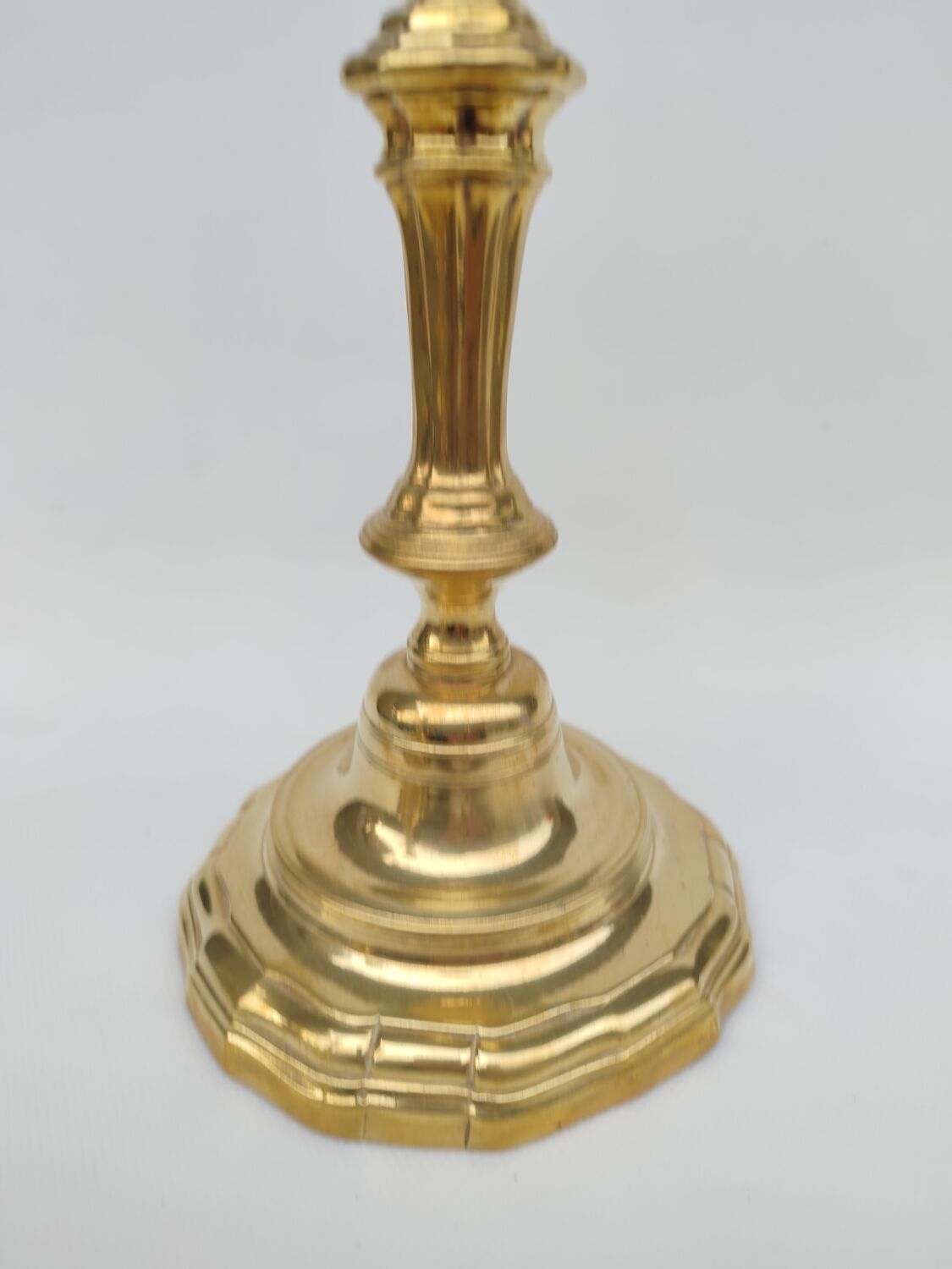 Pair of solid brass candlesticks, early 18th century.