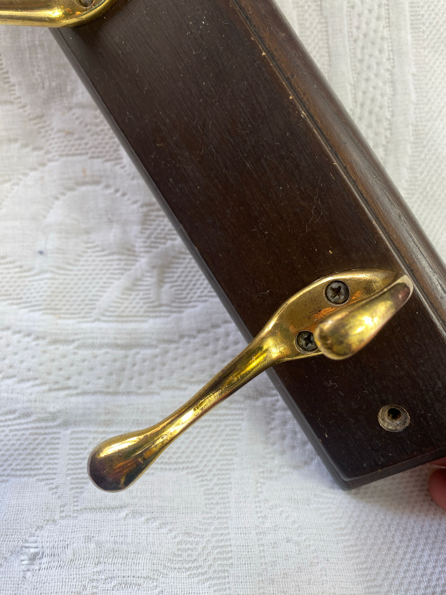 Wooden coat rack with double brass hooks