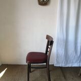 Set of 8 bistro chairs in vintage red wood and leatherette.