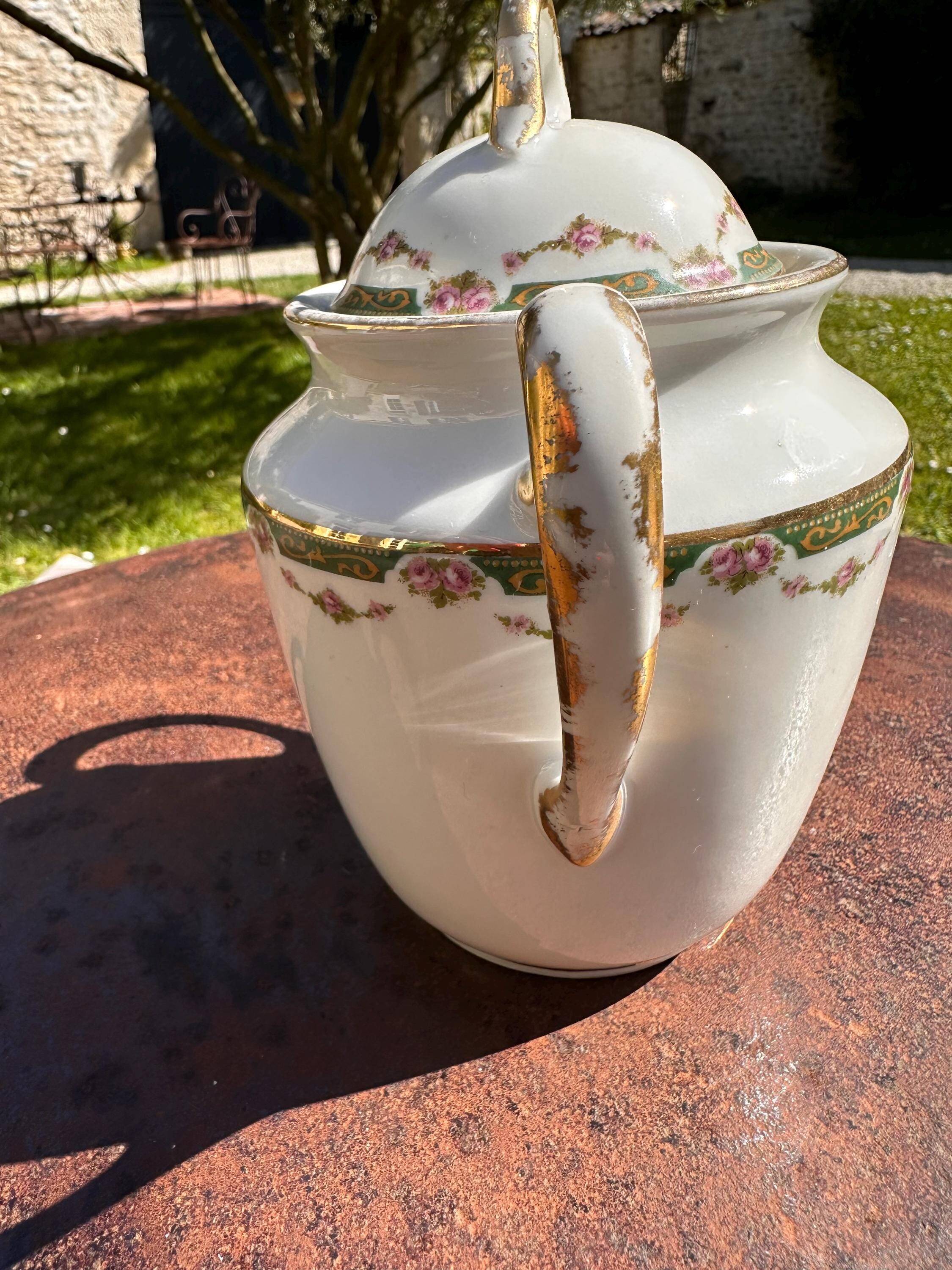 Set of jug, sugar bowl, and milk jug in Limoges porcelain by Paul Past.