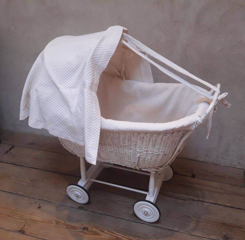 Wicker and painted wood baby cradle