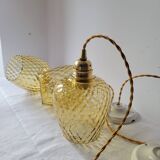 Trio of yellow glass pendant lights