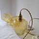 Trio of yellow glass pendant lights