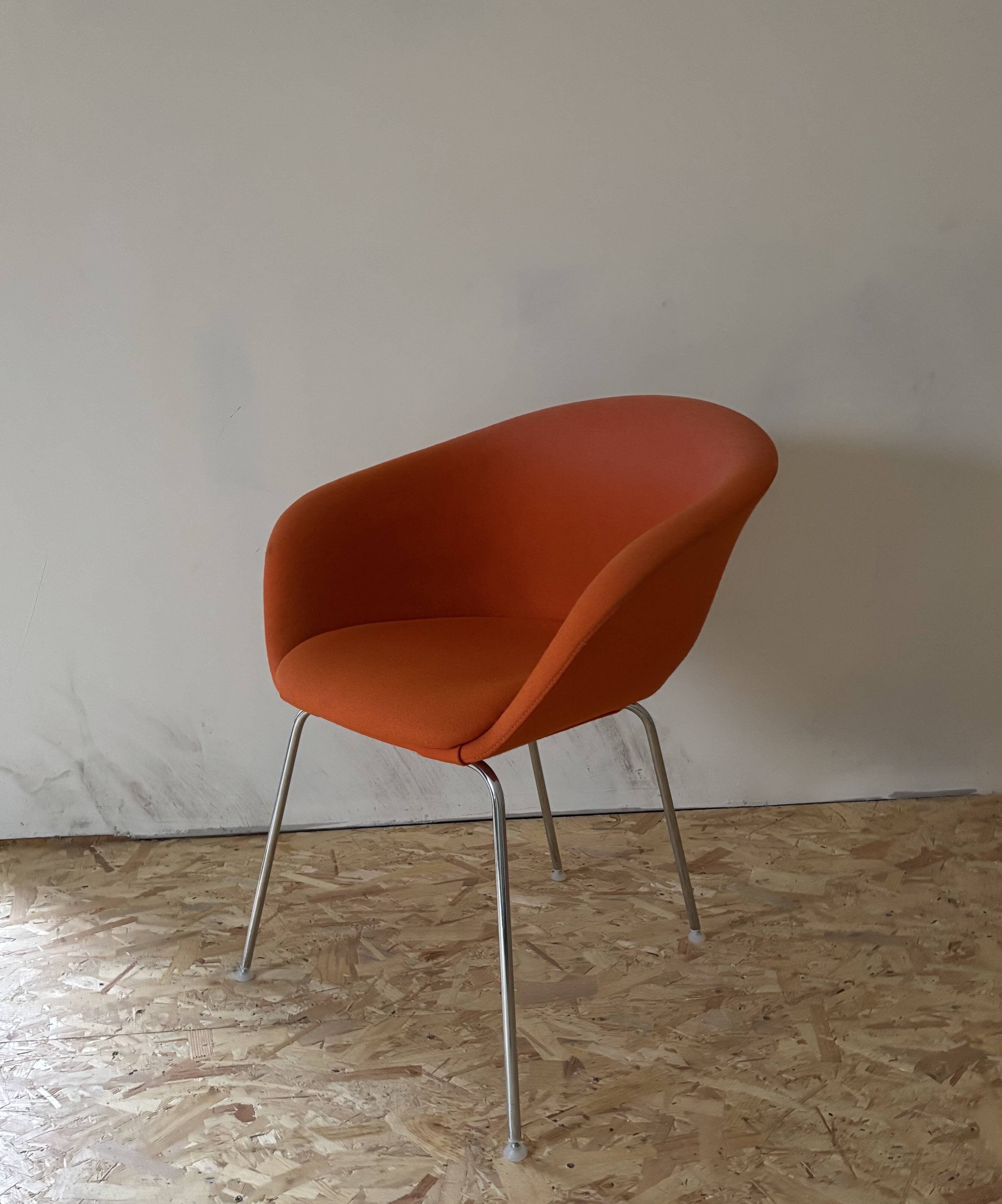Arper Duna orange armchair
