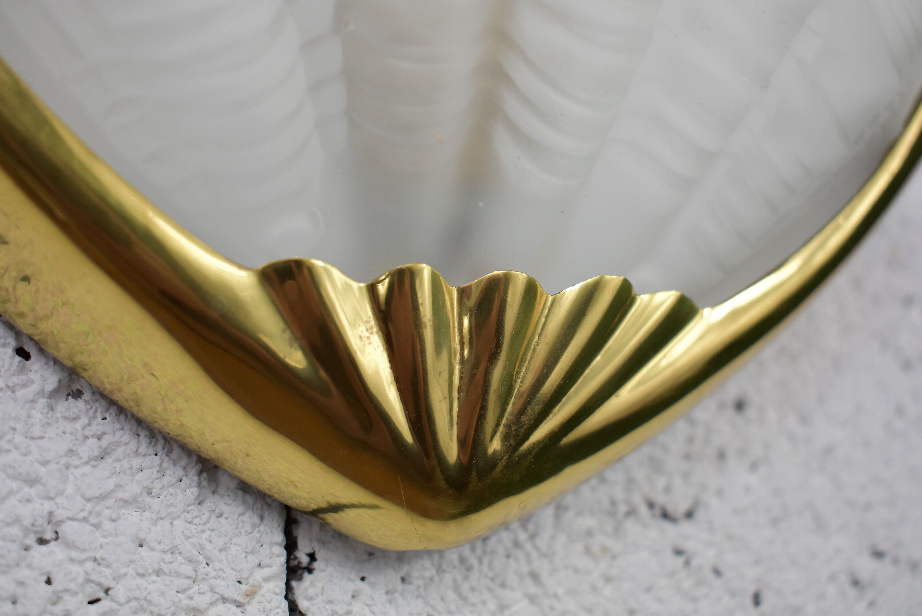 Applies shell shape, glass and brass.