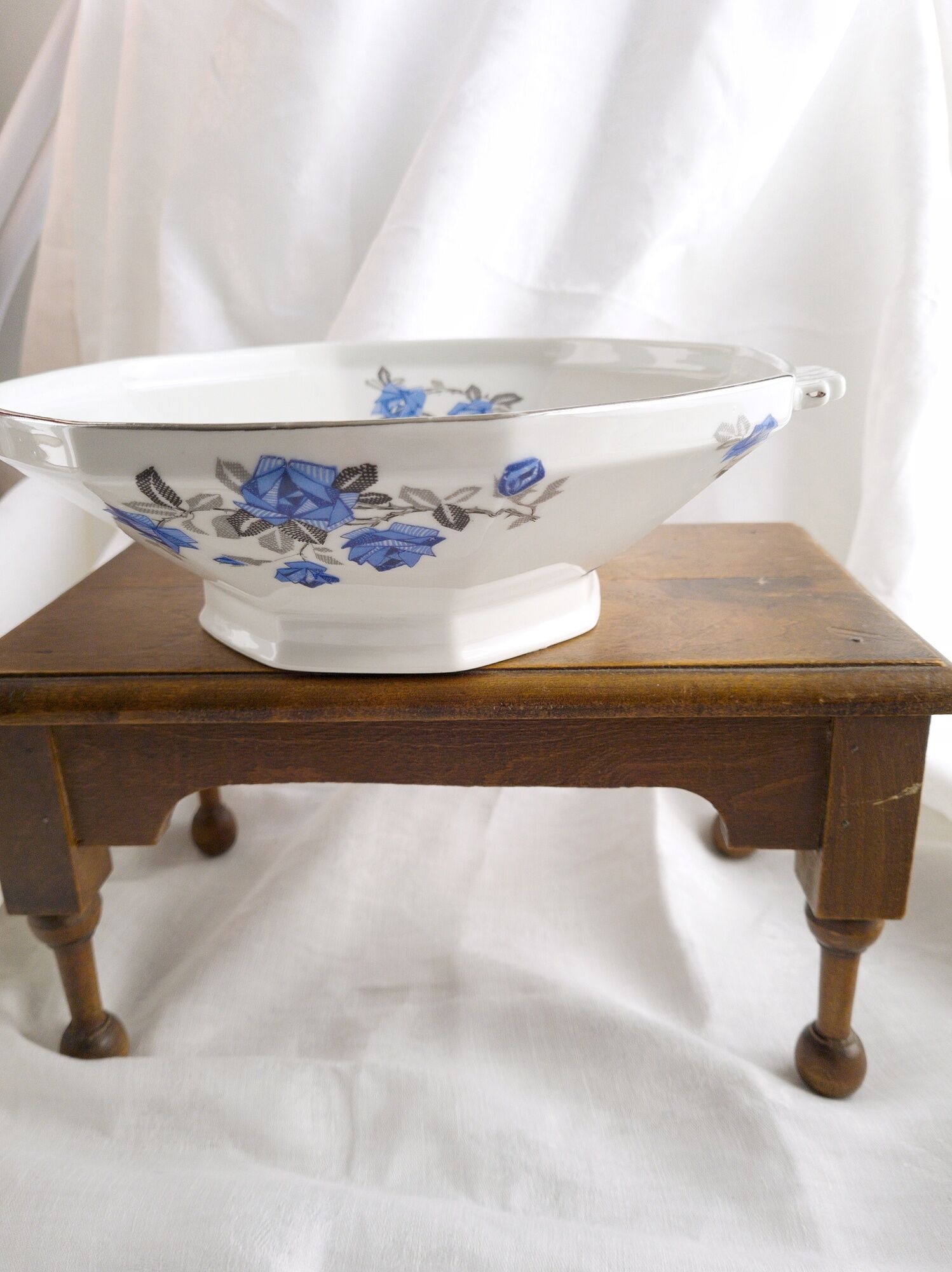 Old porcelain hollow dish of Limoges blue flowers
