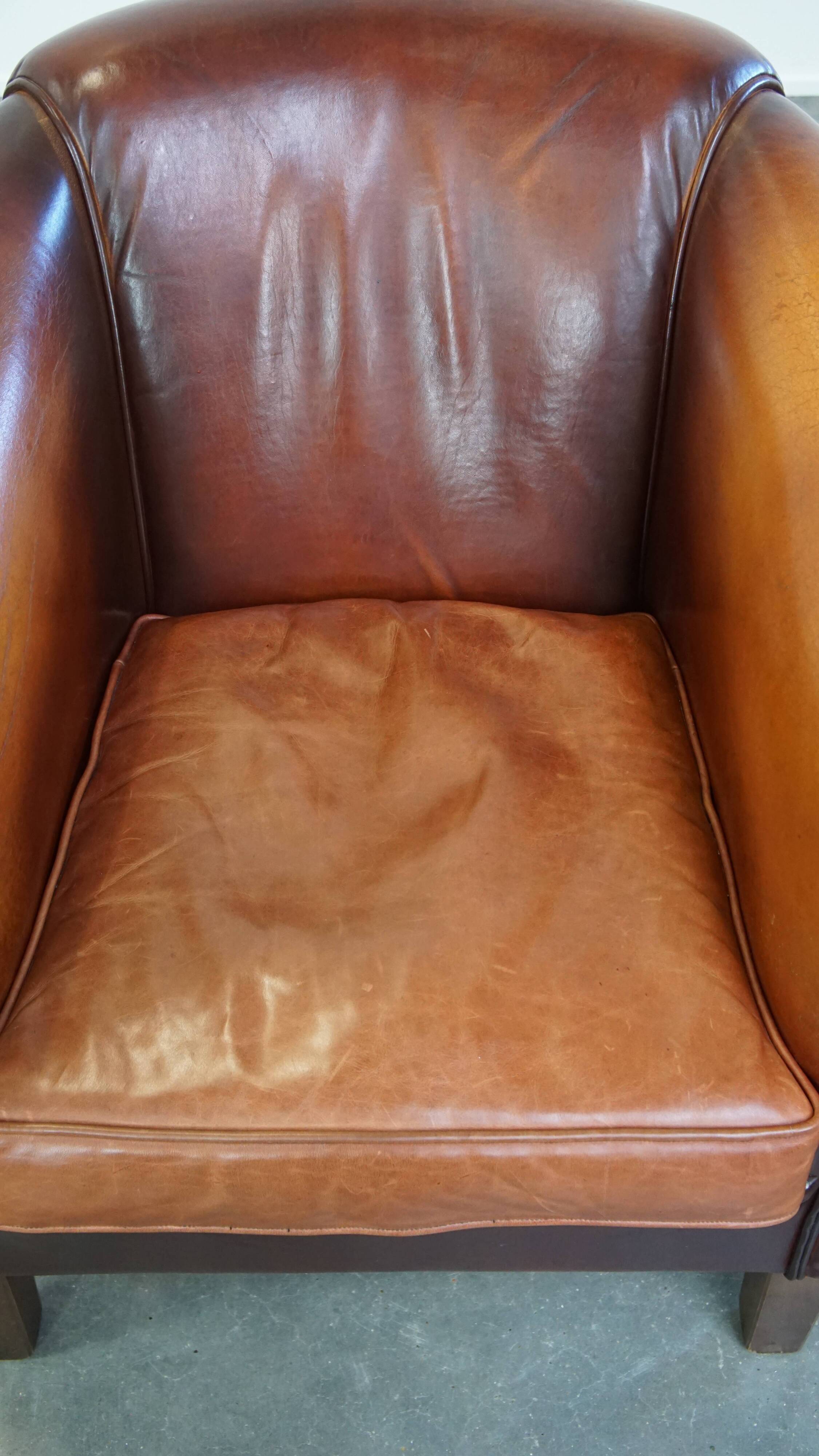 Correctly finished sheep leather club chair