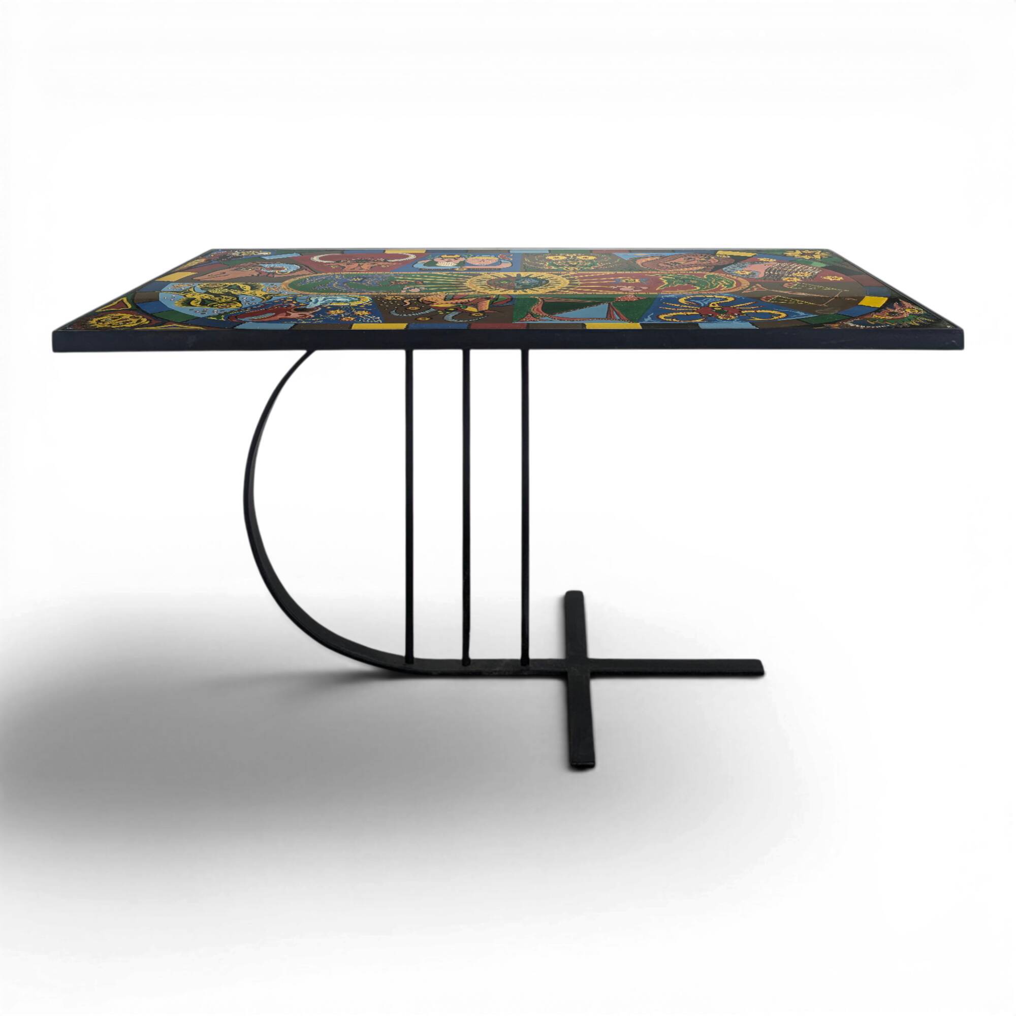 Chrome steel coffee table with zodiac signs decoration.