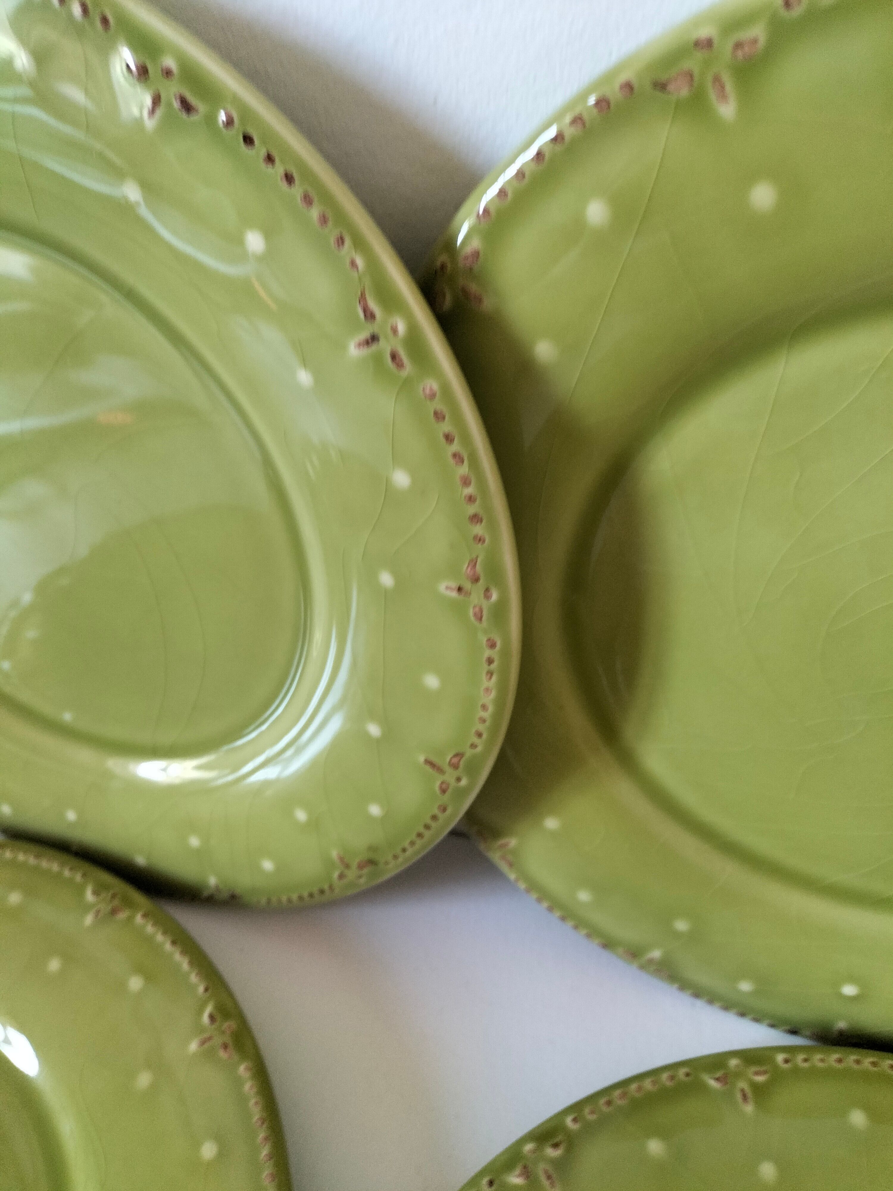 6 olive green plates with dotted relief, workshop ceramic style