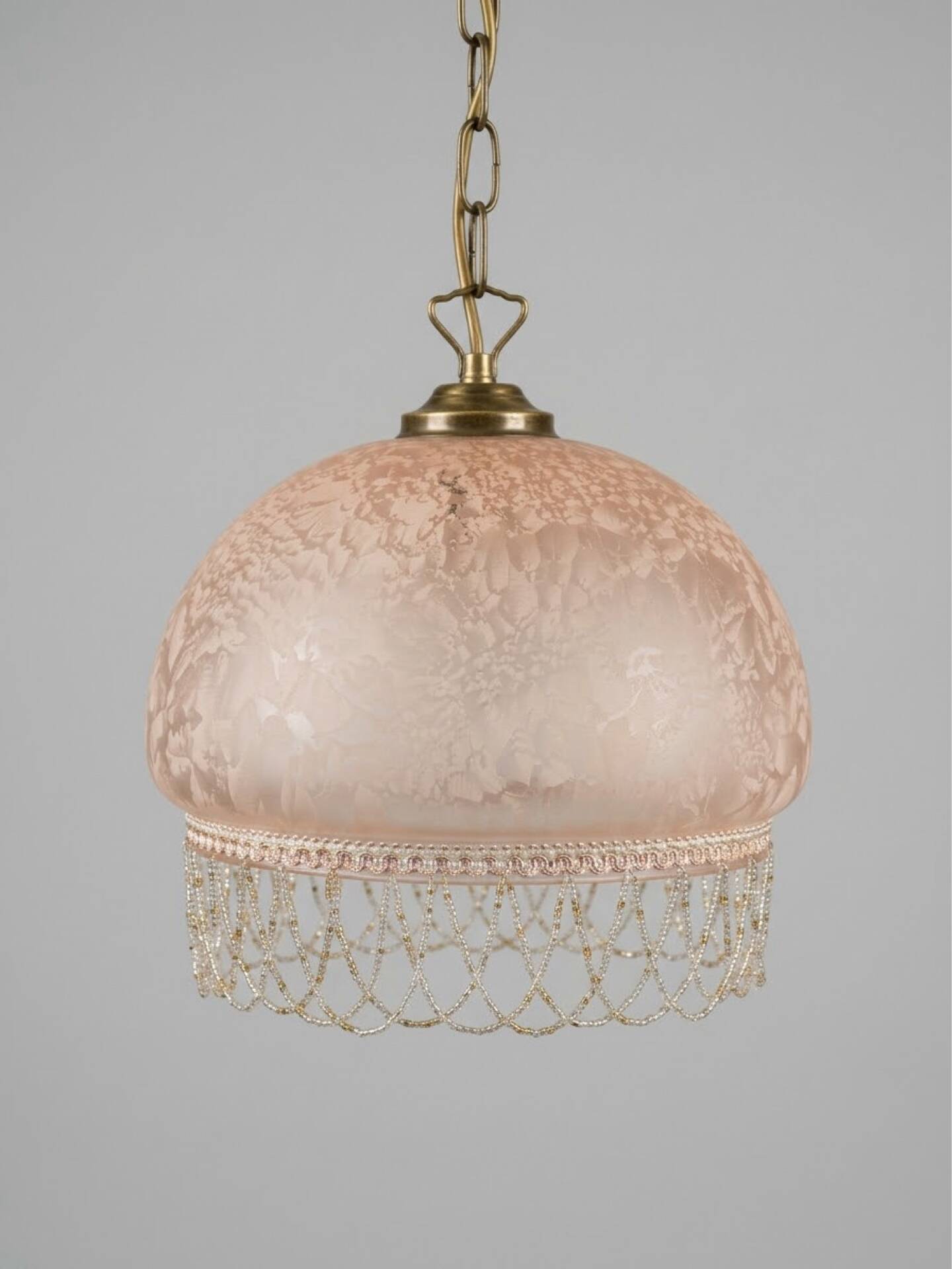 Vintage suspension in frosted pink glass with pearl pendants.