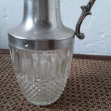 Old glass and silver metal wine carafe