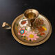 Vintage brass candle holder and floral paintings