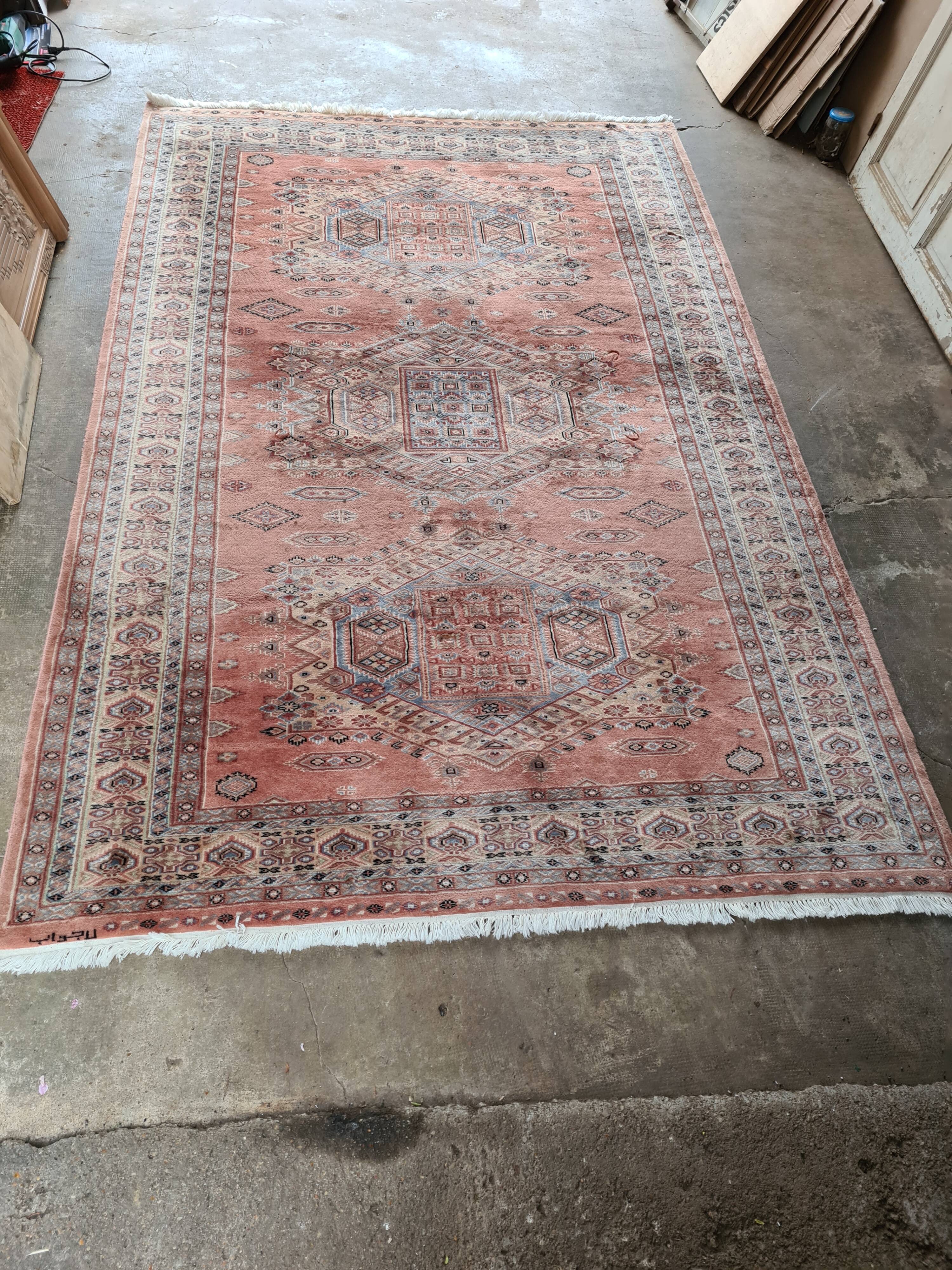 Handmade pink oriental carpet