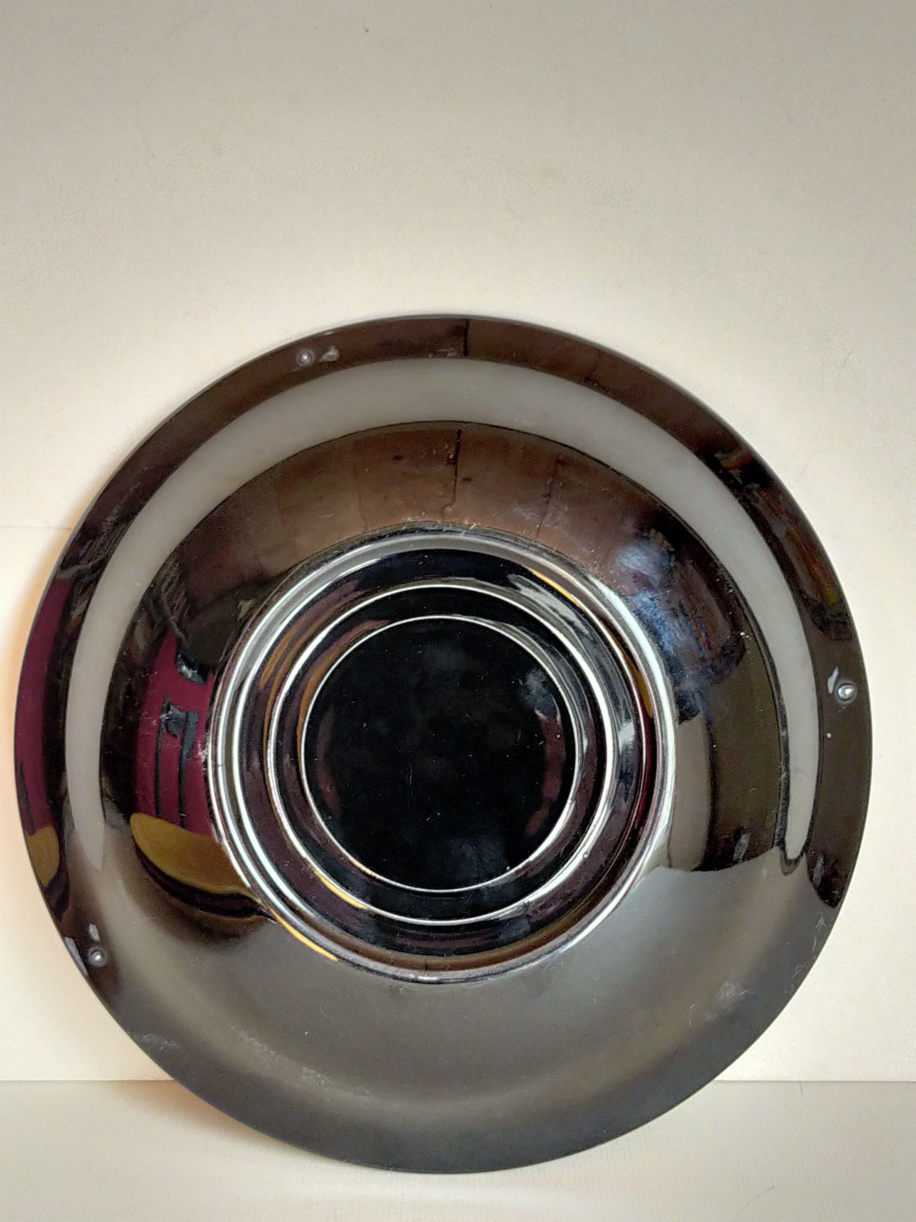 Four multicolored soup plates from the 1950s