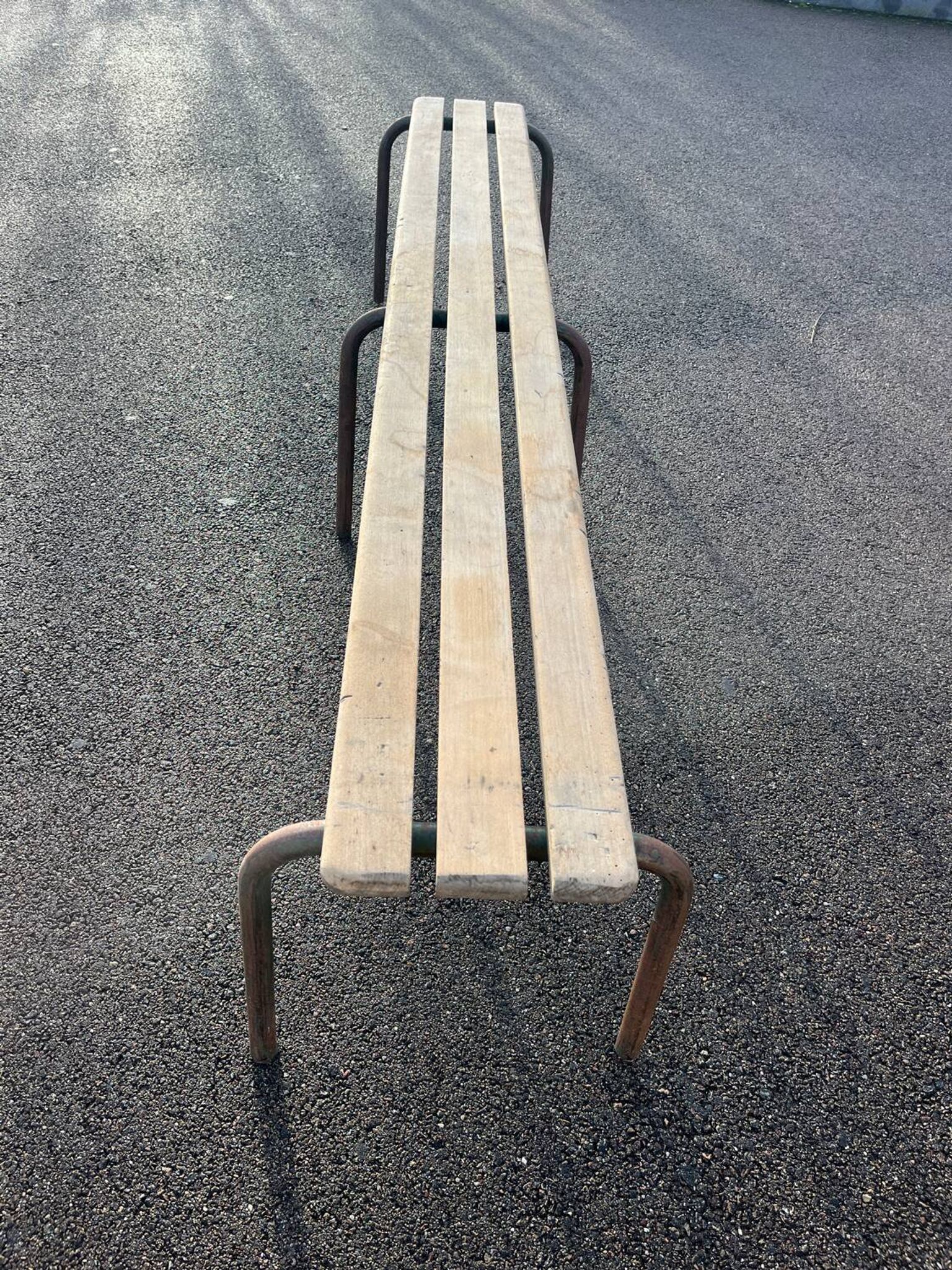 Large vintage school bench from the 1950s, made of wood and metal
