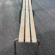 Large vintage school bench from the 1950s, made of wood and metal