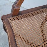 Louis XV Regency cane armchair leather armrests decorated with shell
