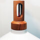 Hanging Ozcanay Dinlatma, contemporary in white metal and wood. Very good condition.