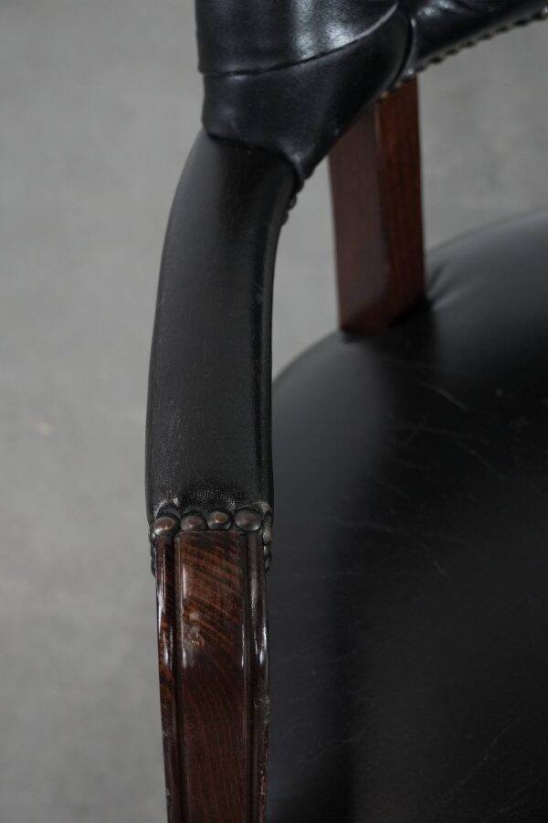 Adjustable black timeless Chesterfield office chair made of cow leather