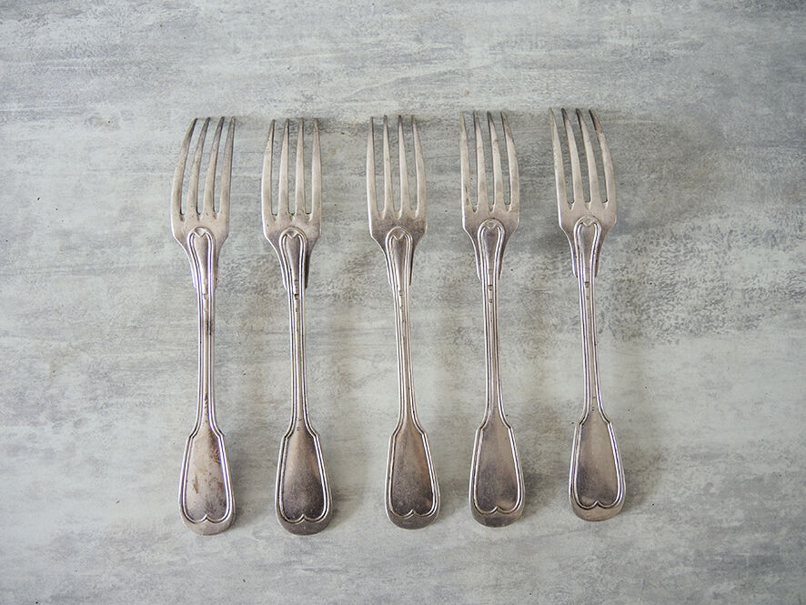 5 old table forks in silver metal