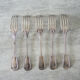 5 old table forks in silver metal
