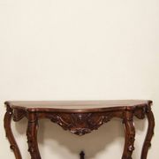 Antique console in carved walnut in the Louis-Philippe style.