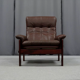 Pair of armchairs and ottoman in leather, 1970