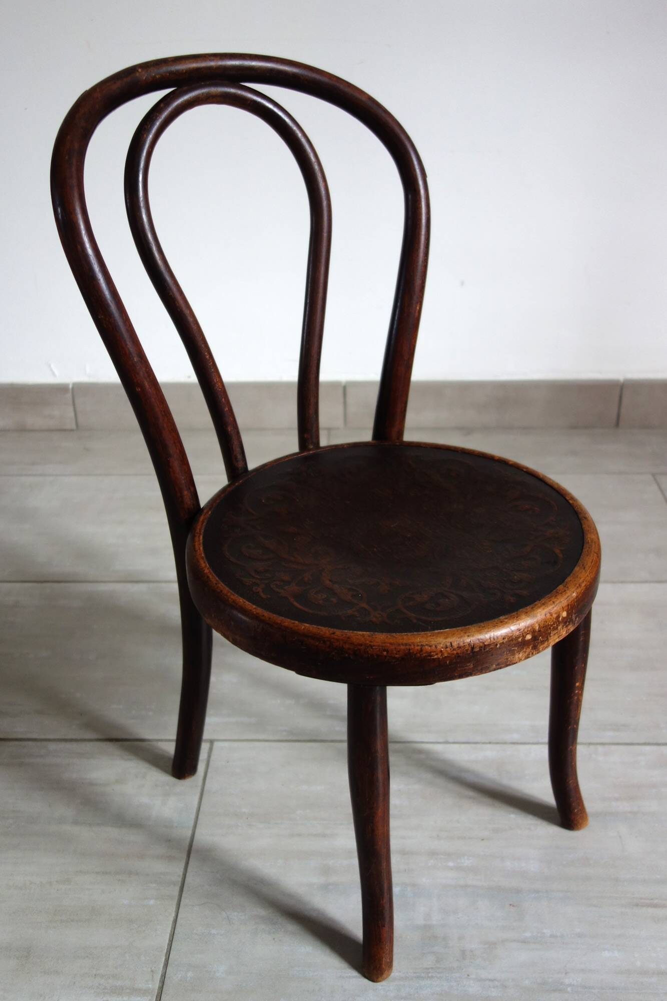 Antique curved wooden children's chair by Fischel, early 20th century.