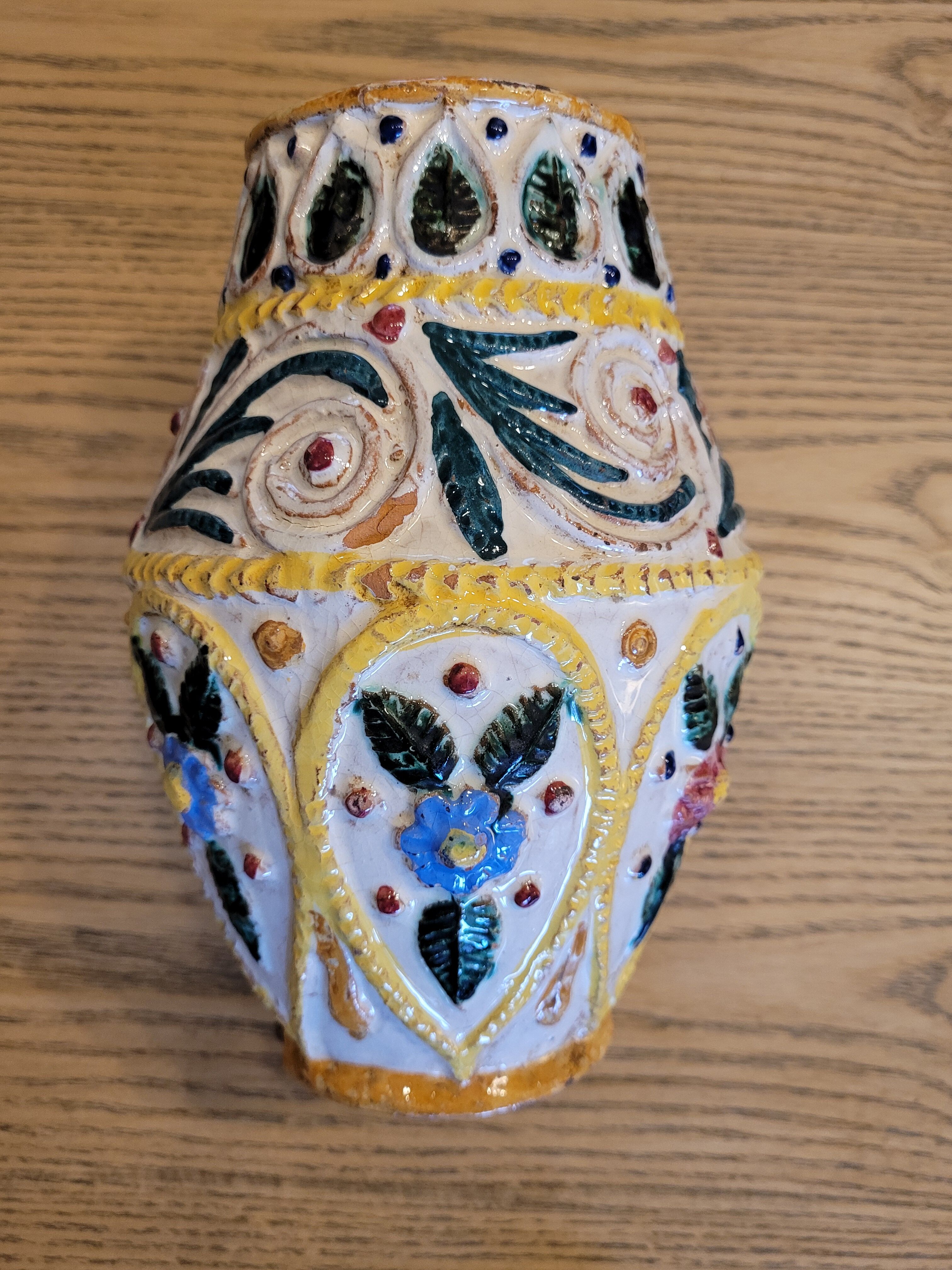 Hand-carved and hand-painted vase