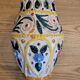 Hand-carved and hand-painted vase