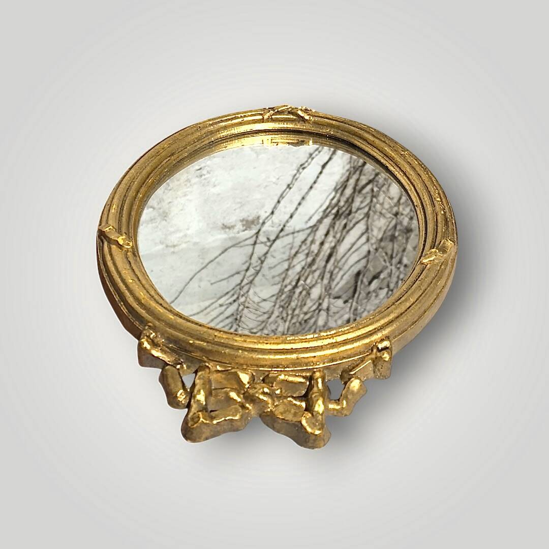 Antique oval wall mirror in gilded resin – Louis XVI knot –