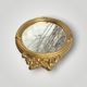 Antique oval wall mirror in gilded resin – Louis XVI knot –