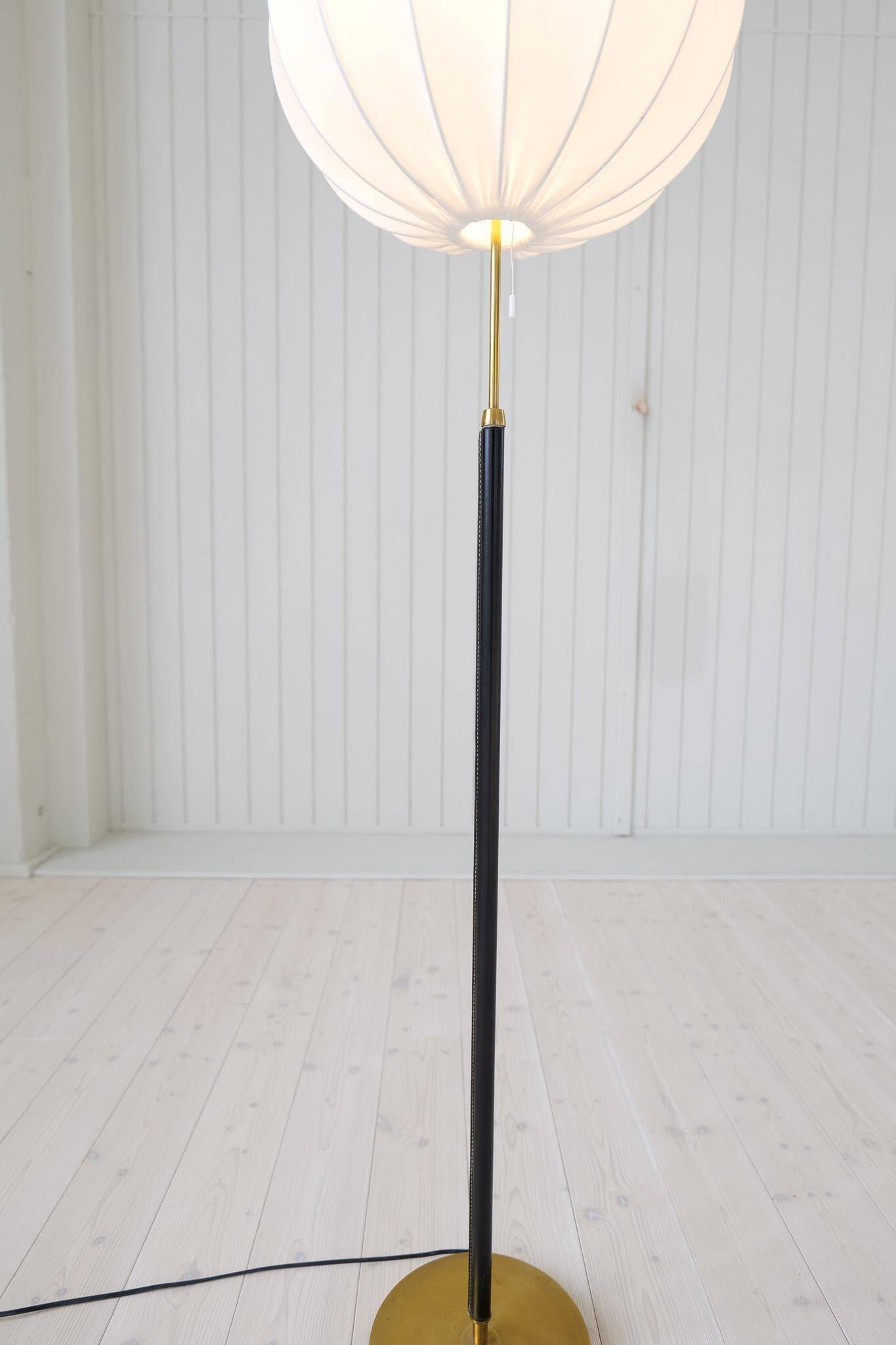 Mid-century black leather floor lamp by Falkenbergs Belysning, Sweden, 1960s.