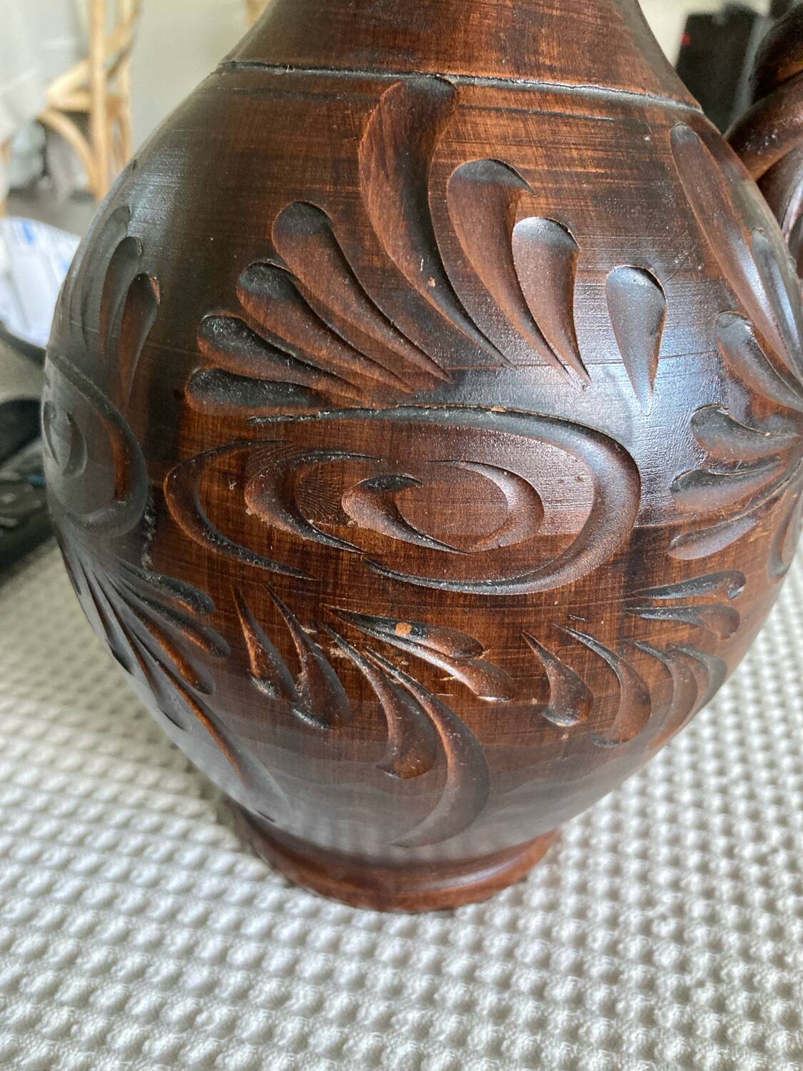 Scarified ceramic vase with twisted handle - African style