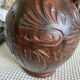 Scarified ceramic vase with twisted handle - African style