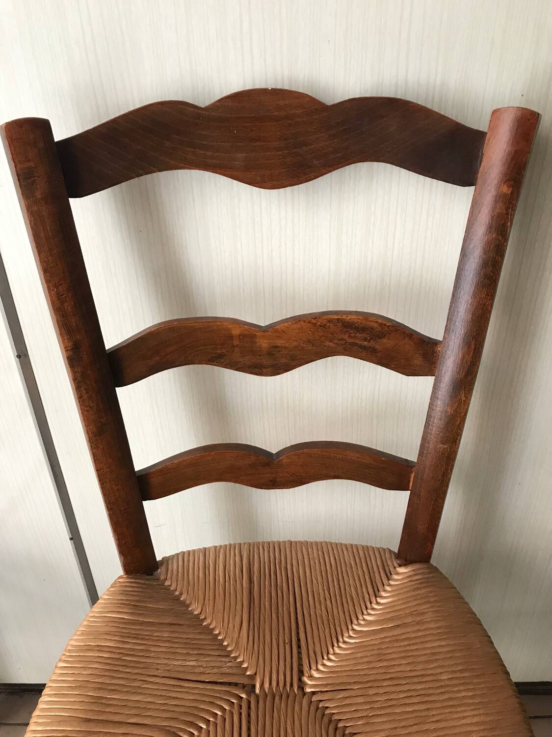 Wooden and straw chairs