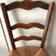 Wooden and straw chairs