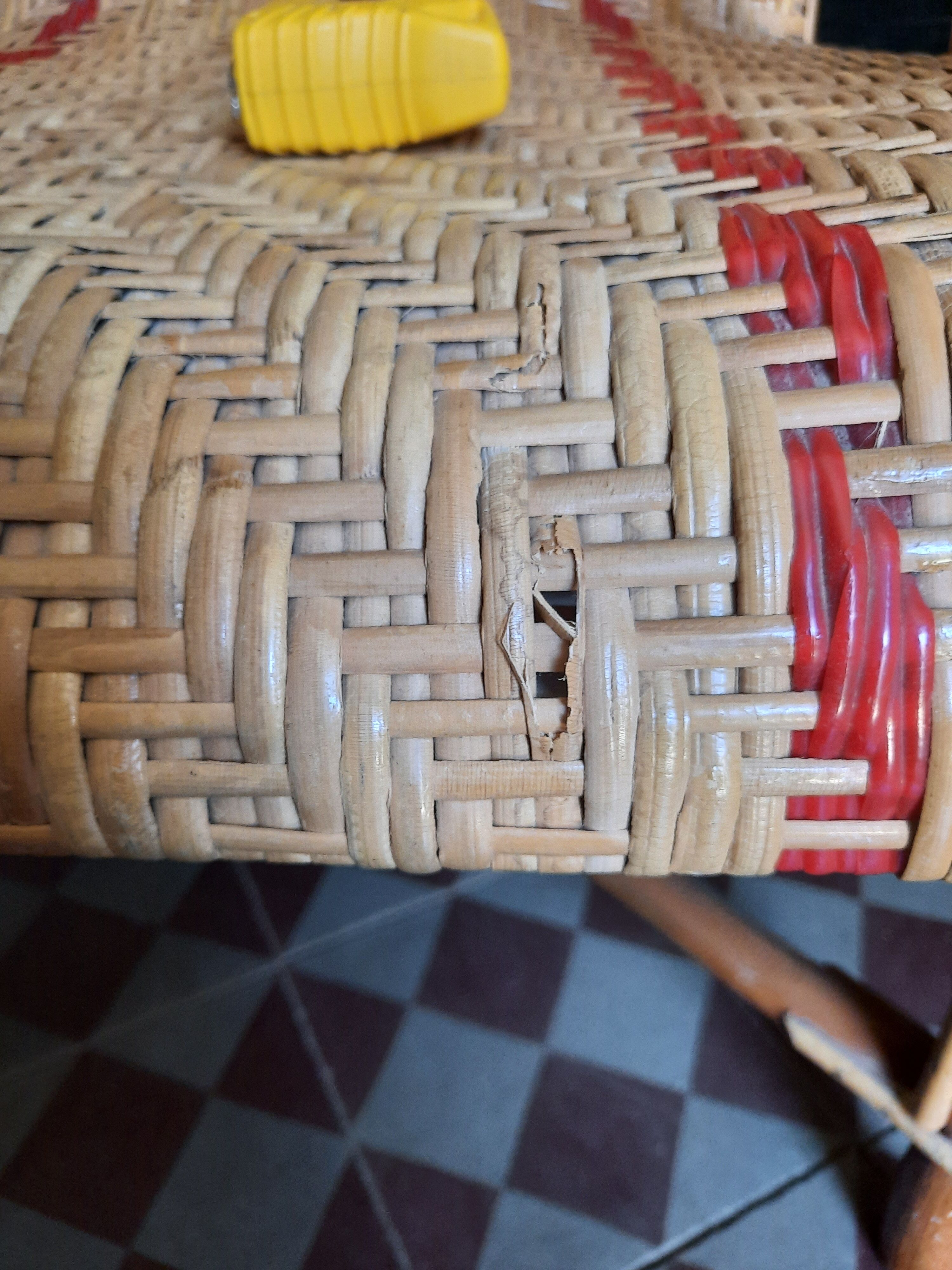 Braided rattan armchair