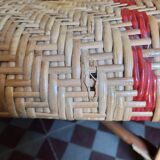 Braided rattan armchair