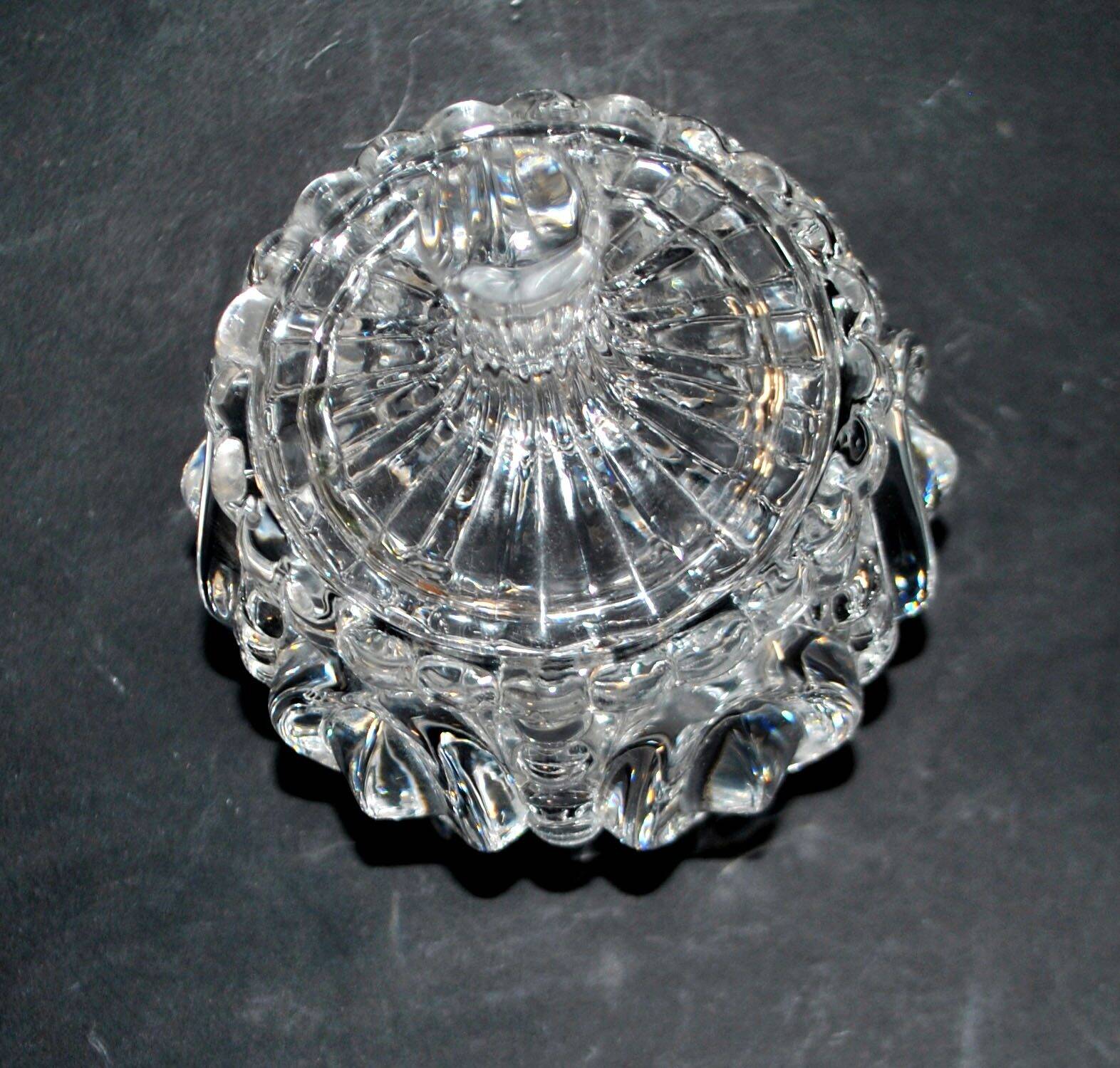 Thick moulded crystal sugar bowl with a beaded and medallion design.