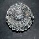 Thick moulded crystal sugar bowl with a beaded and medallion design.