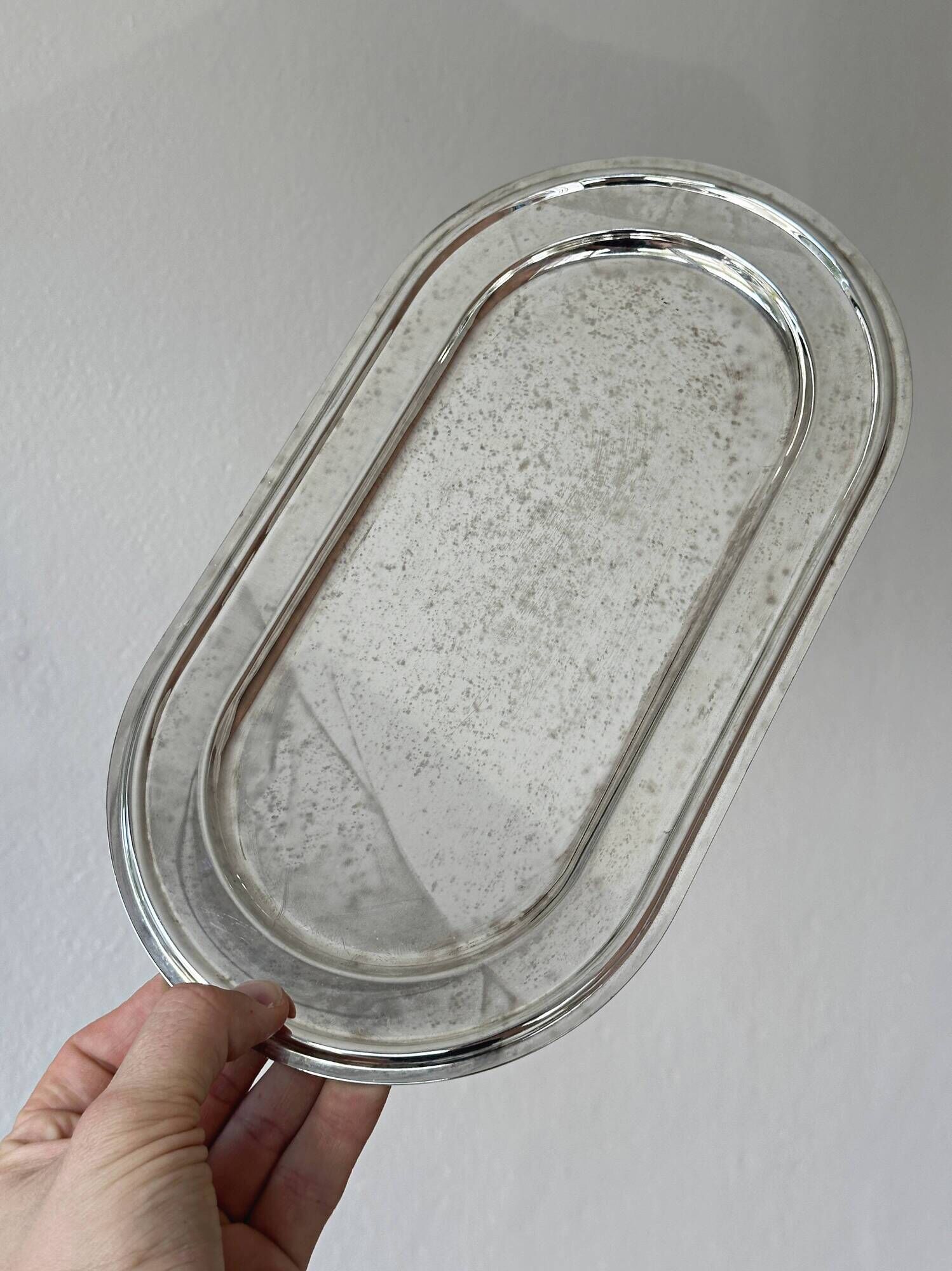 Set of 3 silver-plated trays with a very patinated finish.